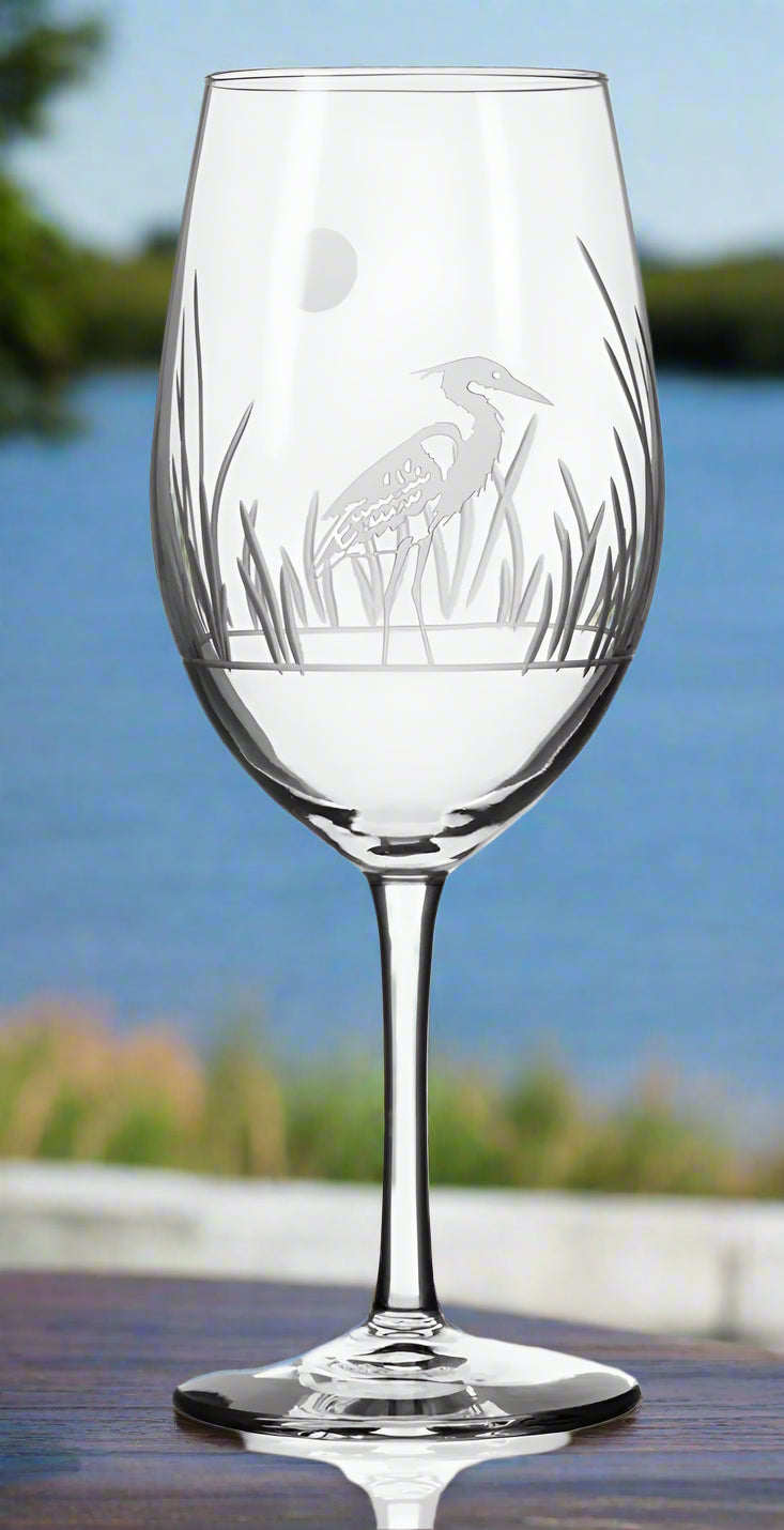 Clear wine glass with engraved heron