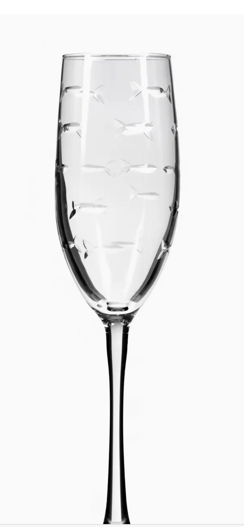 Clear champagne flute with engraved school of fish