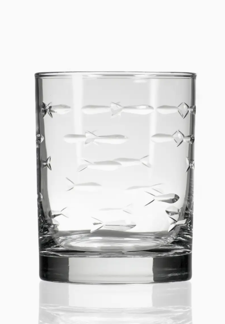 Clear cocktail glass with engraved school of fish